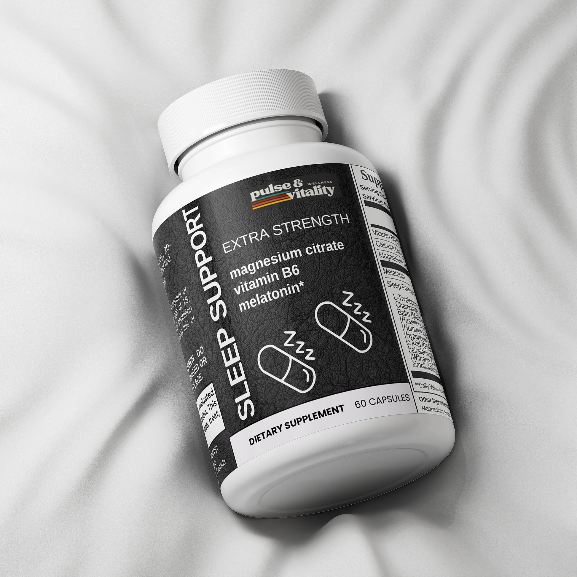 Sleep support supplement bottle on a gray fabric background