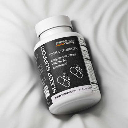 Sleep support supplement bottle on a gray fabric background